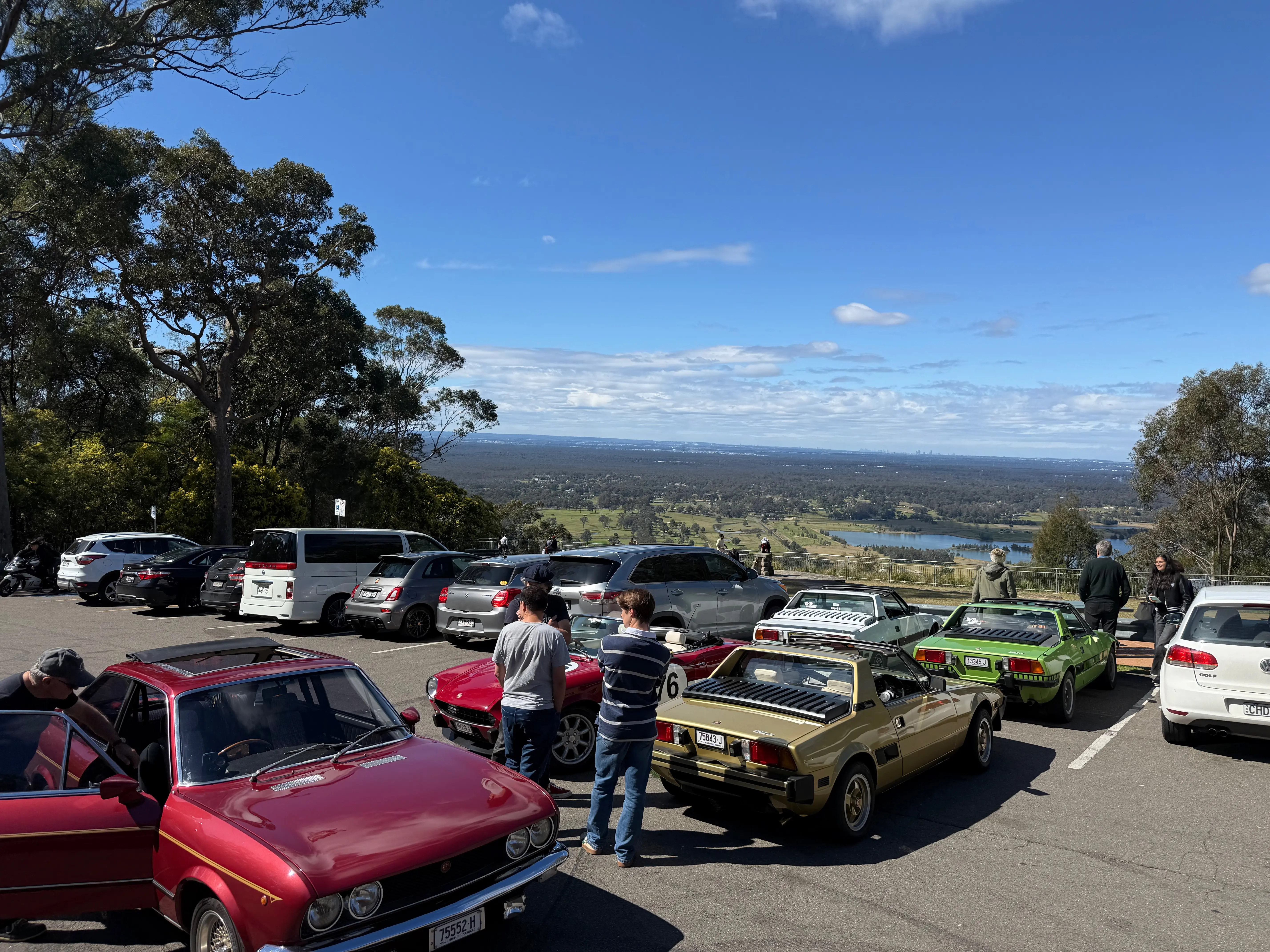X1/9 Australia members enjoying a social coffee meetup at an Australian cafe